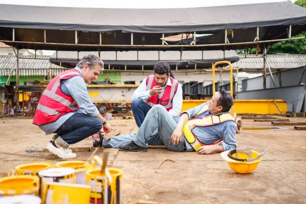 Safety manager reviewing workplace incident data and TRIR metrics
