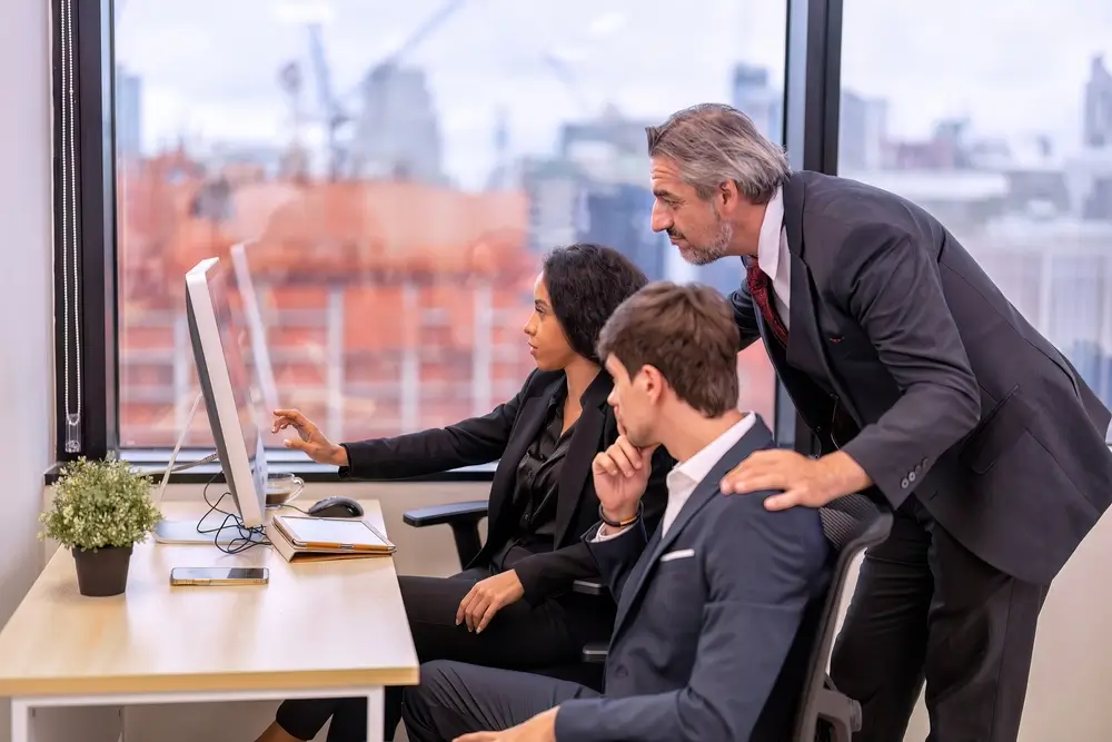Manager supporting employee in workplace mental health conversation